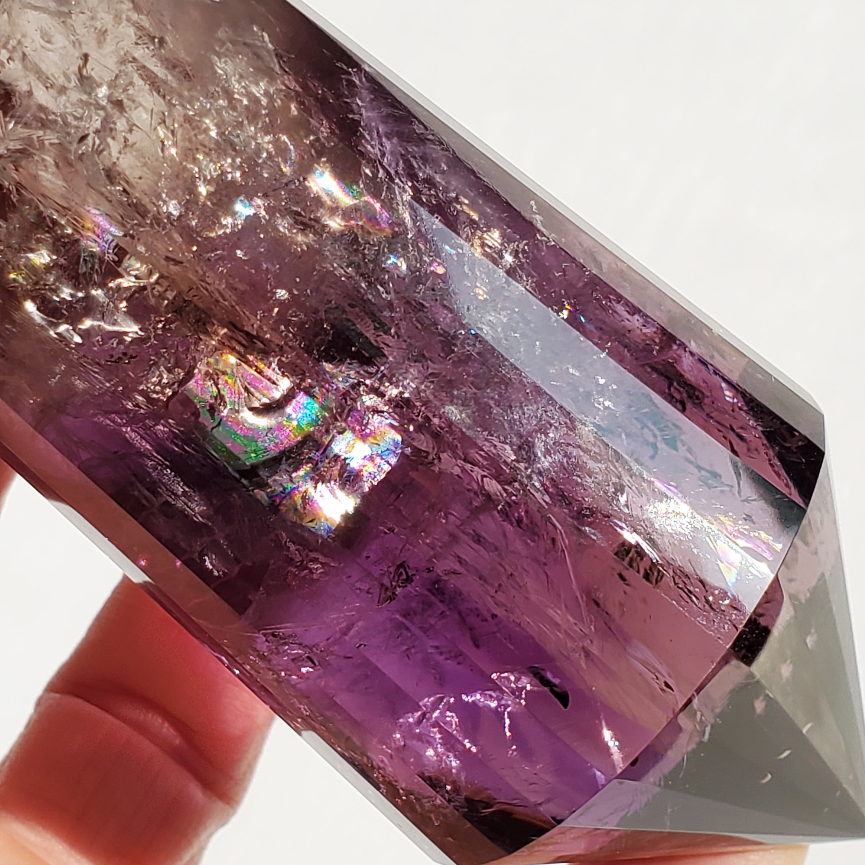 Amethyst Vogel Point with rainbow inclusions