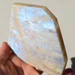 Moonstone slice with Crystal Goddess Statues