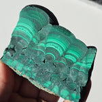 Arfvedsonite plate with a malachite slice