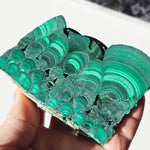 Arfvedsonite plate with a malachite slice