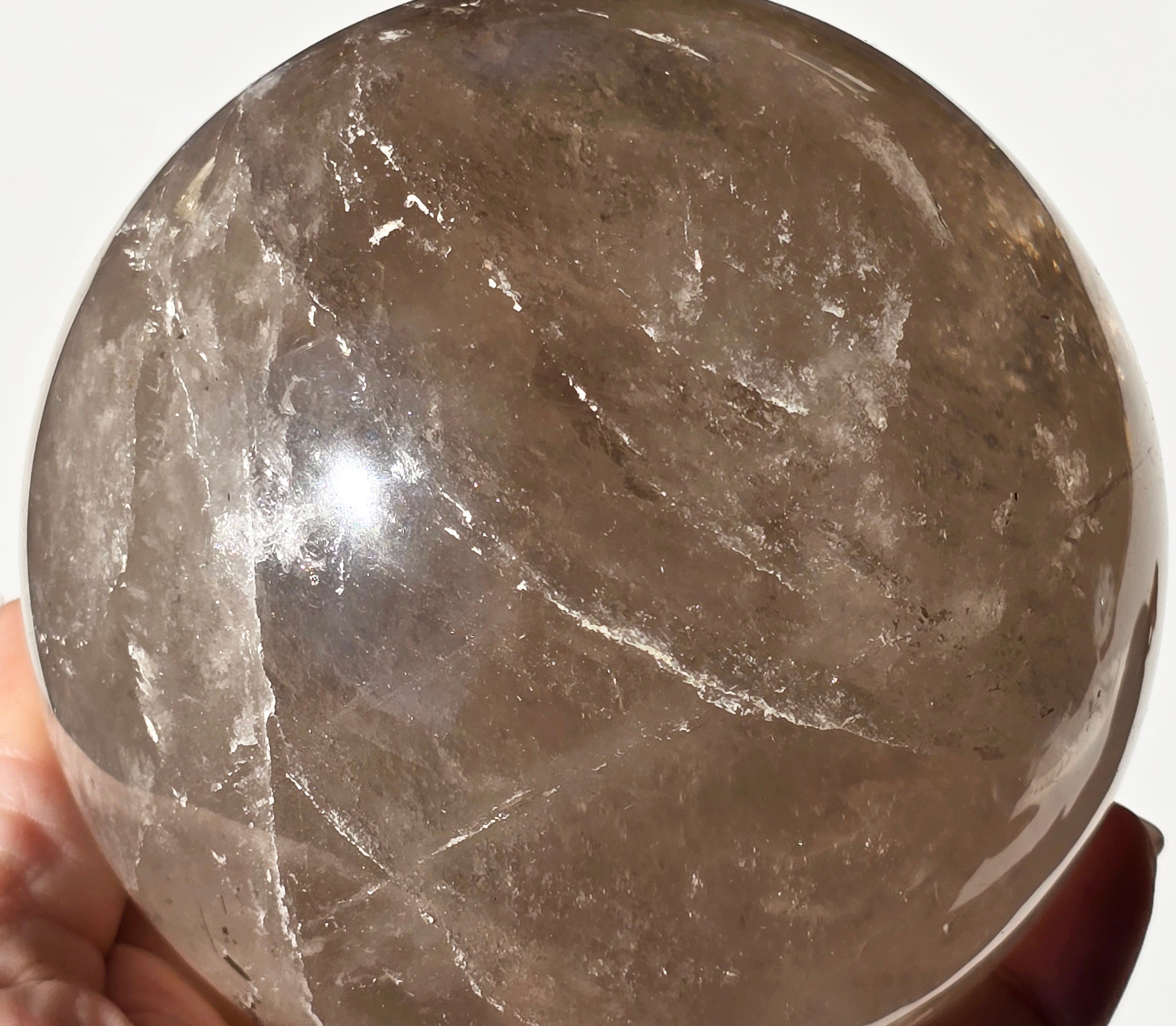 Smoky Quartz Sphere with rainbow inclusions 4"