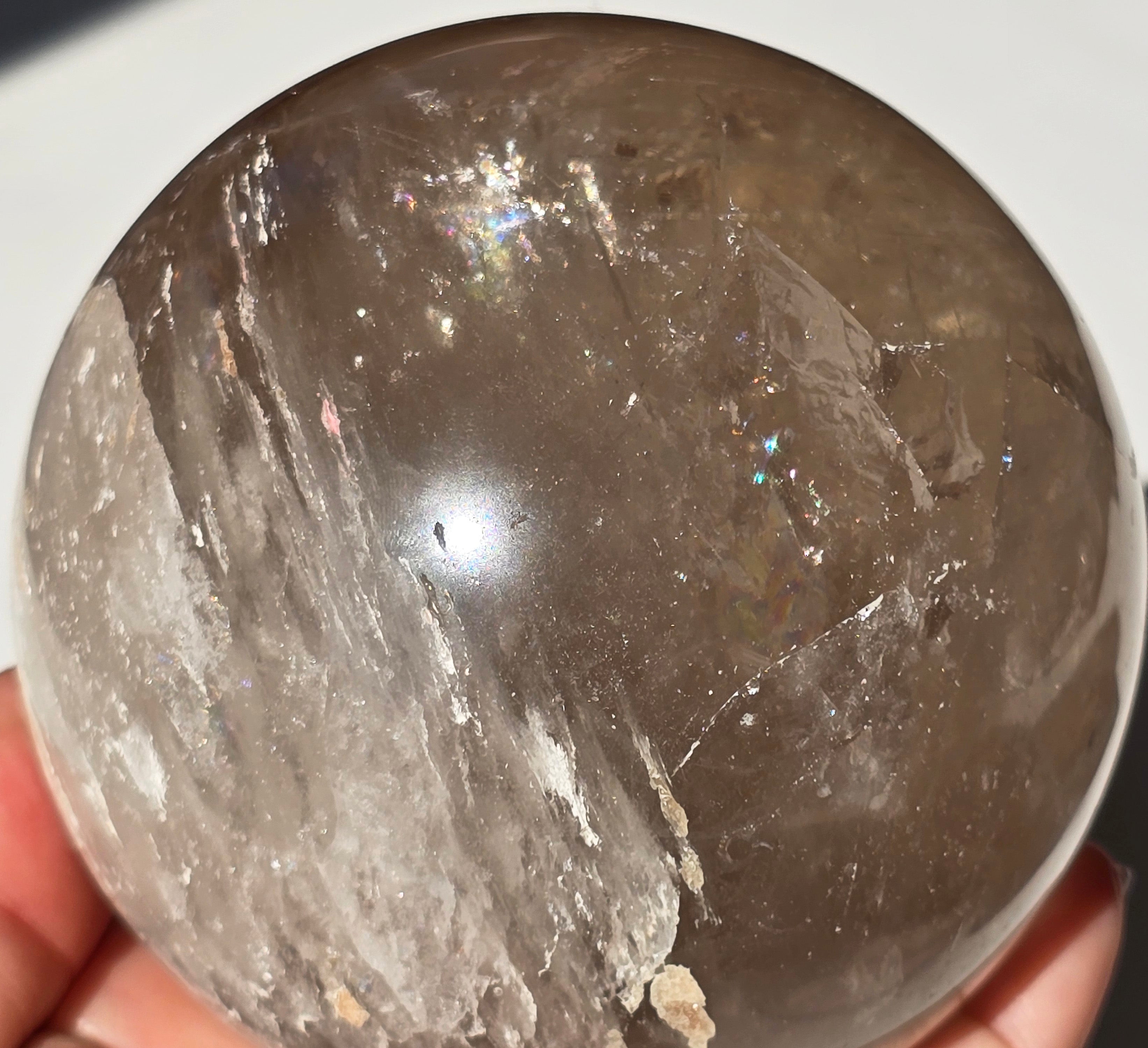 Smoky Quartz Sphere with rainbow inclusions