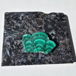 Arfvedsonite plate with a malachite slice