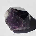 Raw Natural Amethyst Point with rainbow inclusion