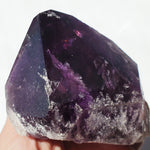 Raw Natural Amethyst Point with rainbow inclusion